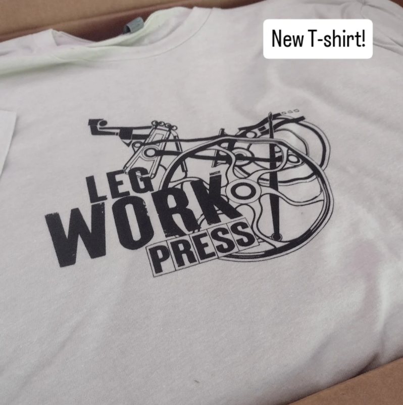 Legwork Press logo screen-printed on a light grey t-shirt